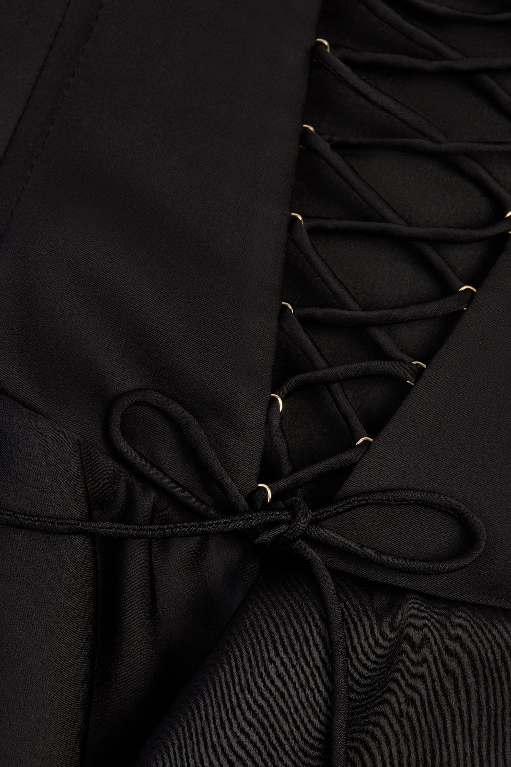 Ruffled Lace Up Corset Playsuit in Black
