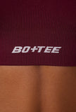 Super Sculpt Seamless Cross Back Sports Bra in Plum