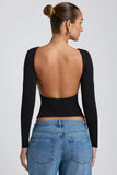 Modal High Neck Long Sleeve Open Back Top in Black