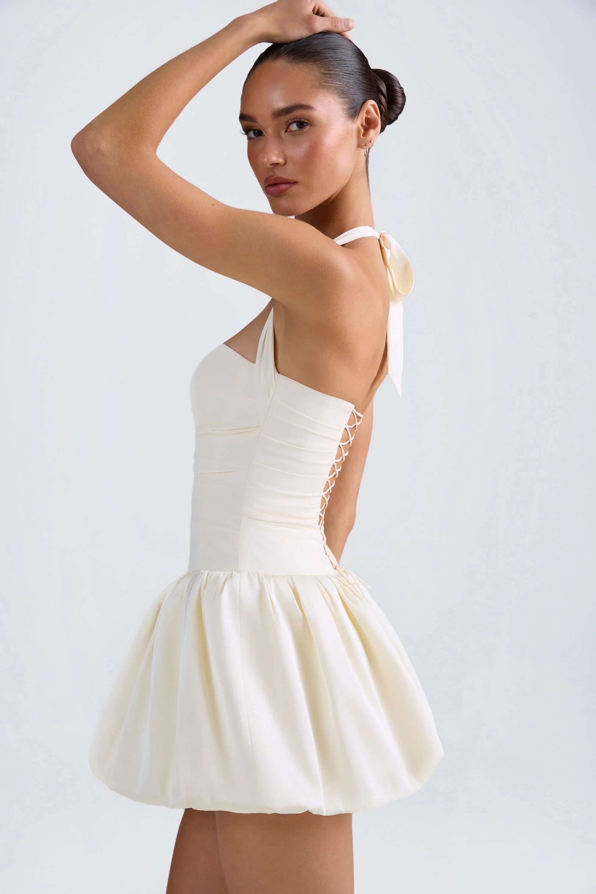 Halterneck Lace Up Bubble Hem Corset Micro Mini Dress in Ivory
