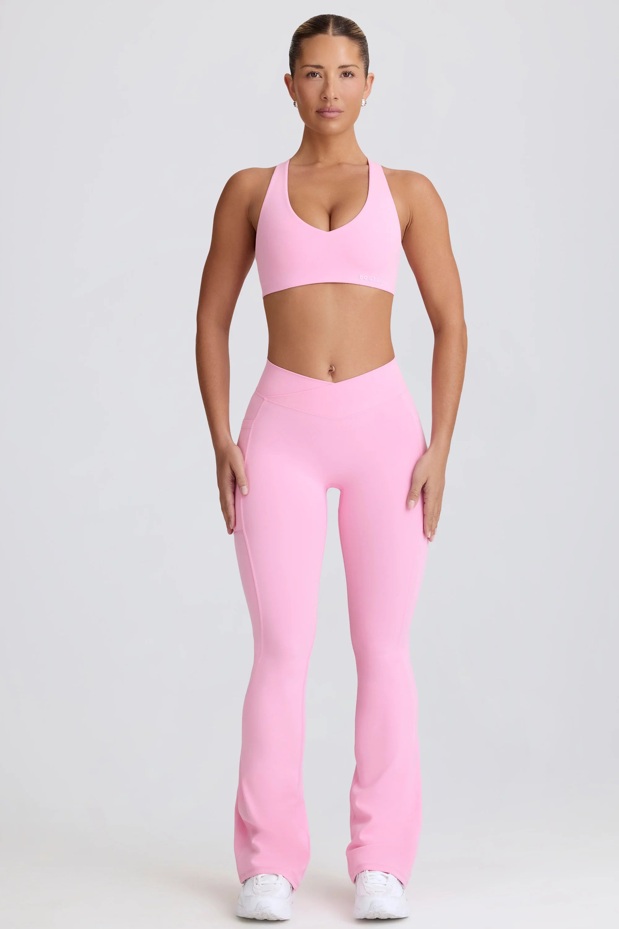 Soft Active V Waist Pocket Flared Leggings in Baby Pink