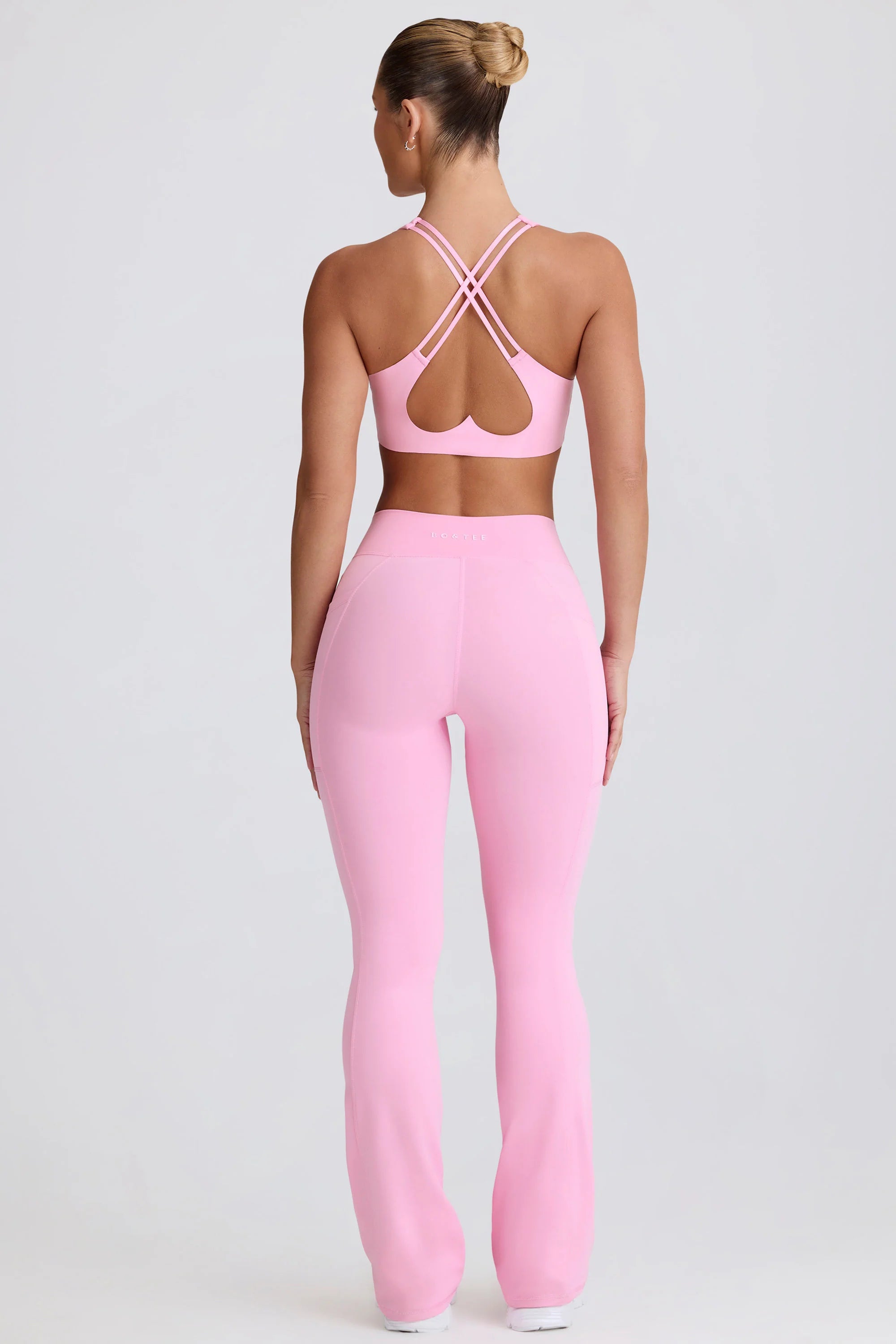 Soft Active V Waist Pocket Flared Leggings in Baby Pink