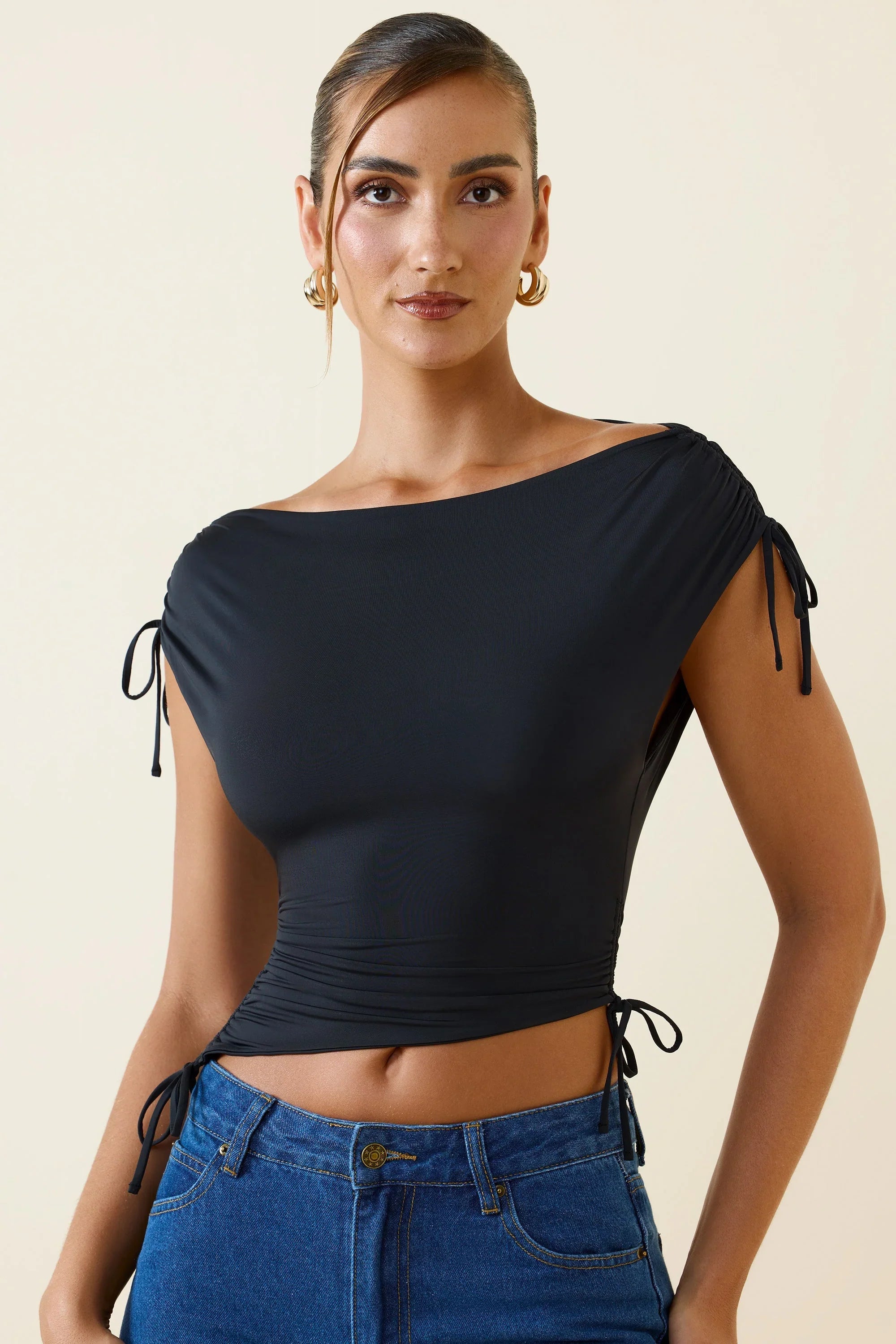 Asymmetric Ruched Cowl Back Crop Top in Black