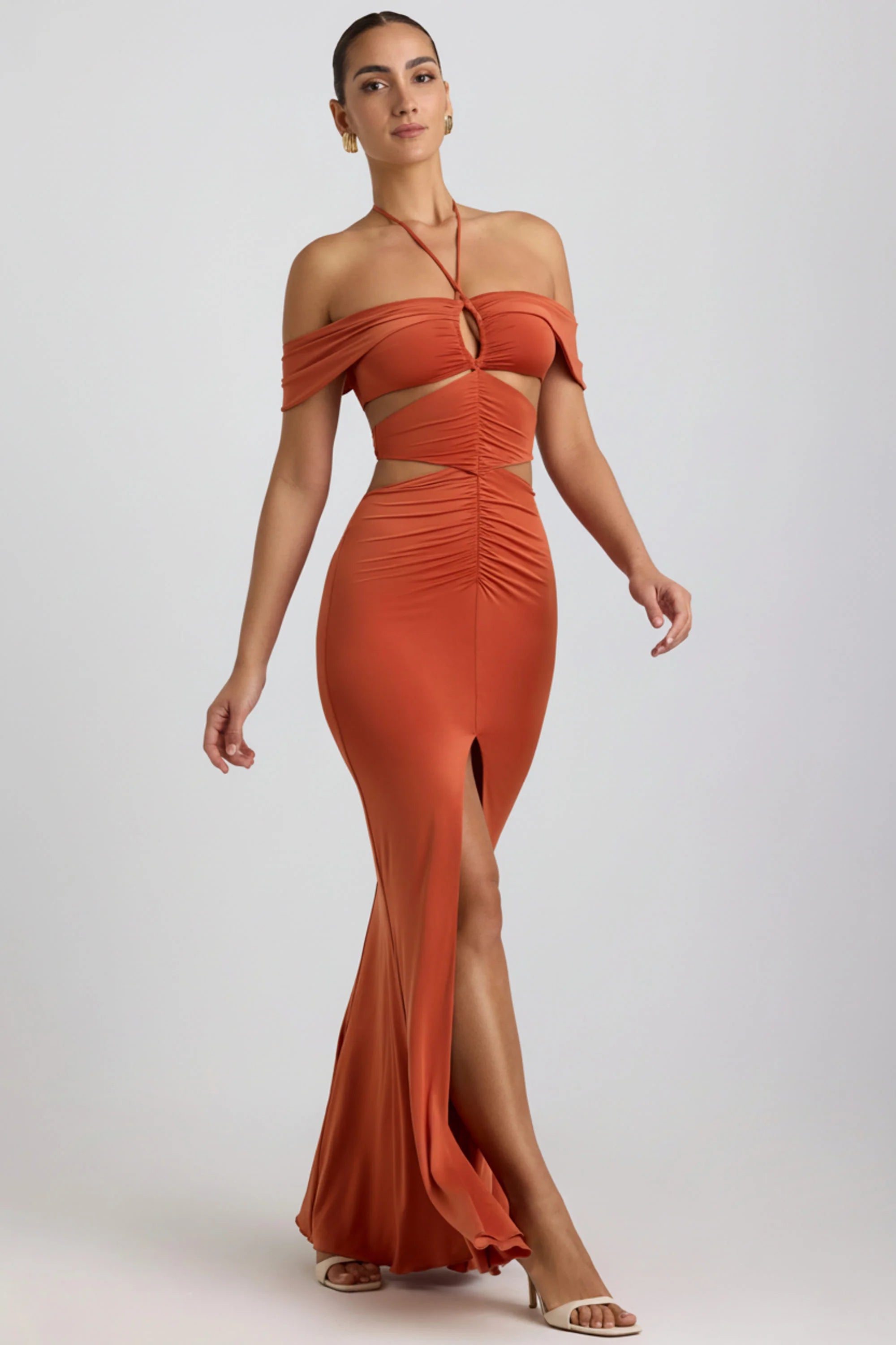 Slinky Jersey Cut Out Halterneck Gown in Burnt Orange